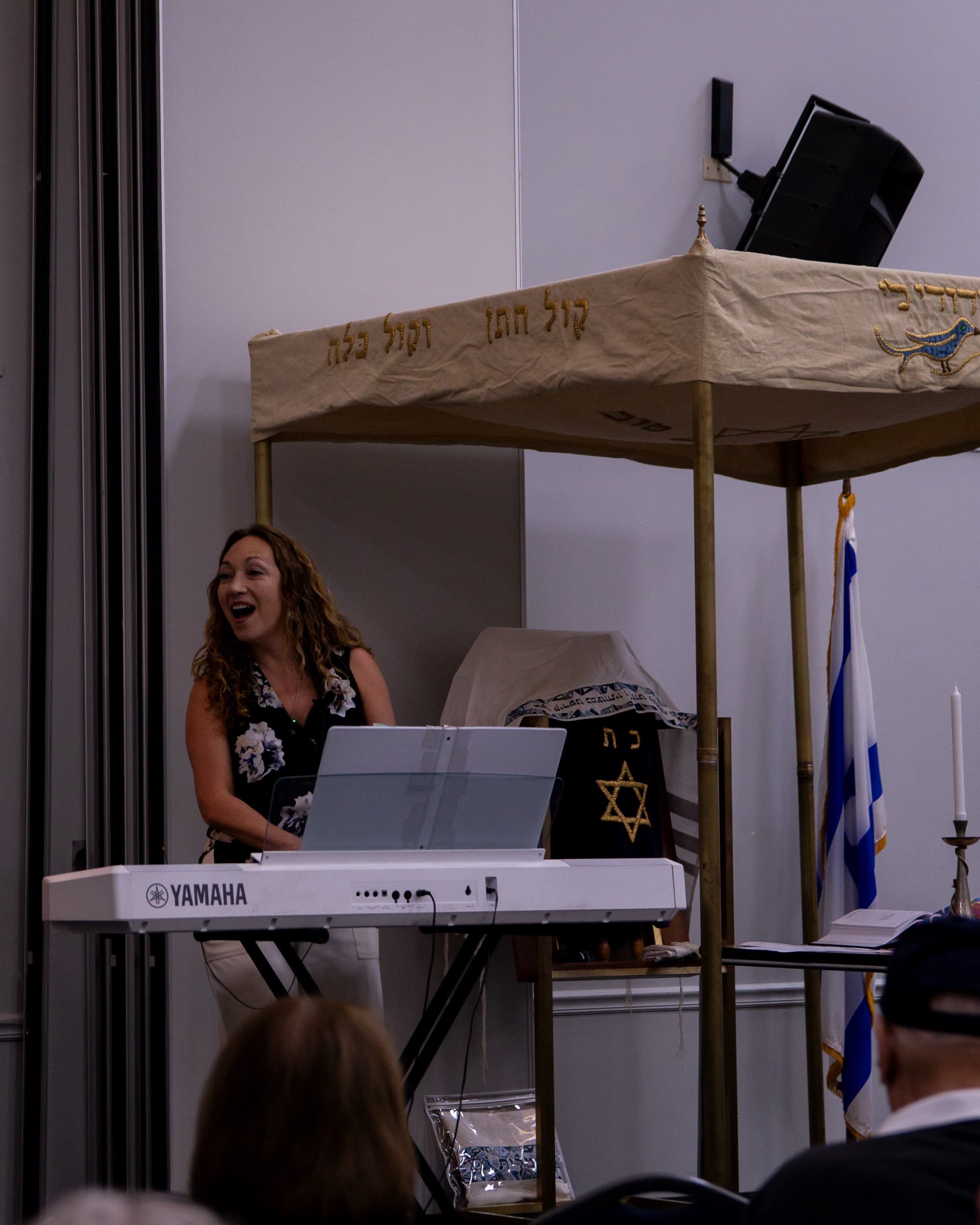 Cantor Anna Zhar singing during a Shabbat service at Temple Beth Sholom